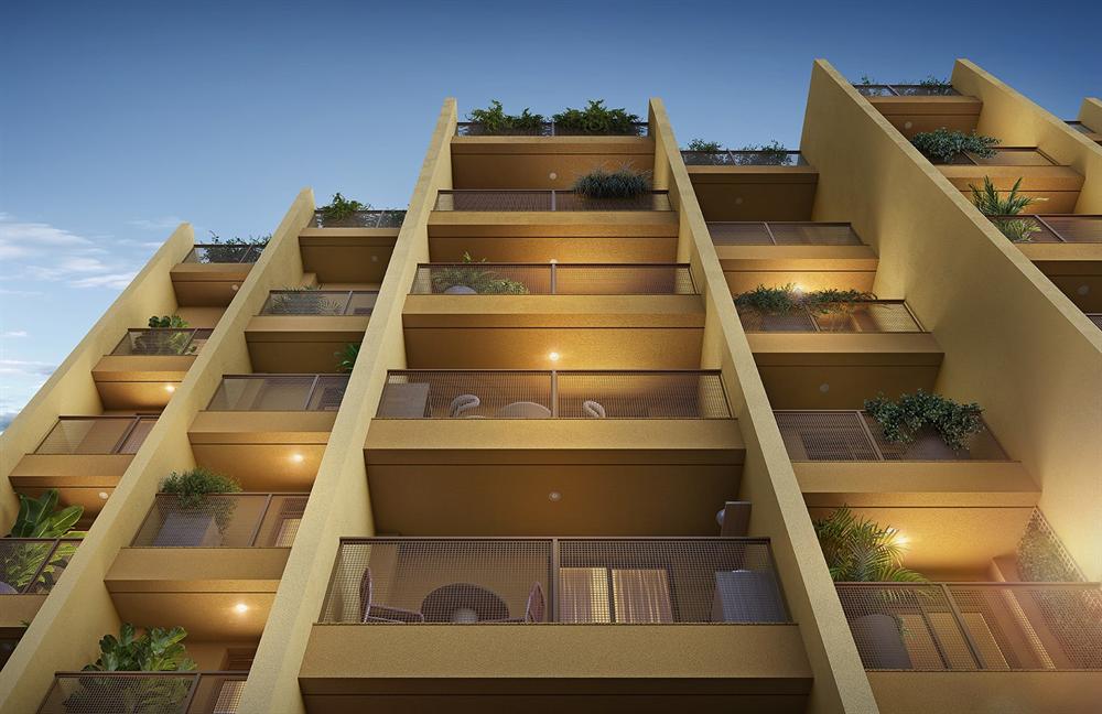 Varandas do Residencial Erê com jardineiras e brises verticais